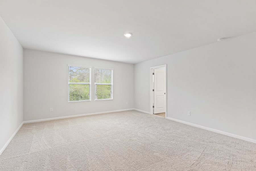 A room with a door and windows. A room with a door and windows.