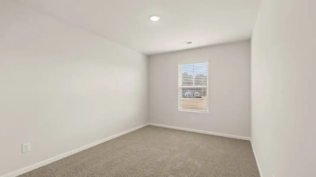 Representative unfurnished interior of a home built from the Ansley by D.R. Horton in Stillwater Lake Oconee, Eatonton (Image 26).
