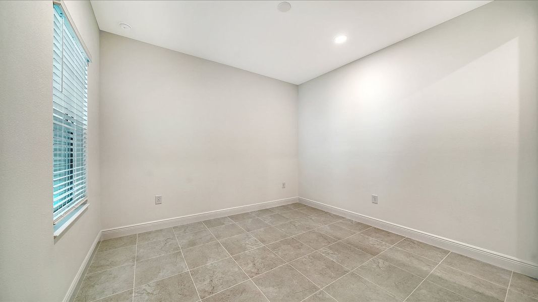 Spacious, unfurnished interior of a new home in Windward Real Estate and Homes for Sale in Sarasota, FL - Neal Communities, Lakewood Ranch (Image 24).