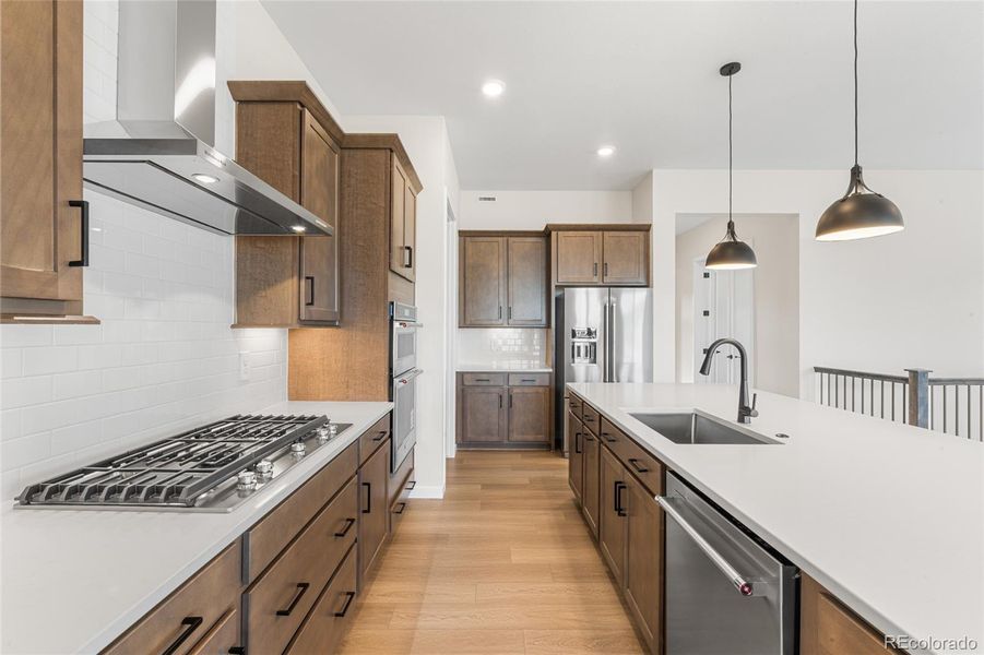 Furnished interior view inside a new home in Hilltop at Inspiration, Aurora (Image 7).
