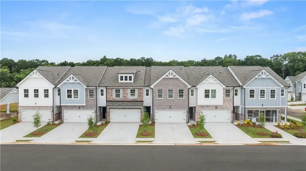 Front exterior of a new home in Union Village, McDonough, GA, highlighting curb appeal (Image 2).