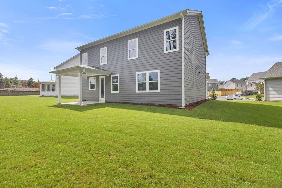 Exterior details and patio area of a home in Maddox Landing, Hoschton (Image 18).