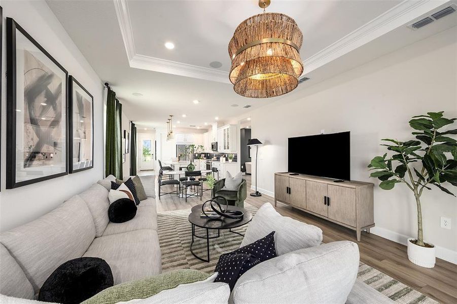 Furnished interior view inside a new home in Esplanade at Wellen Park, Englewood (Image 9).