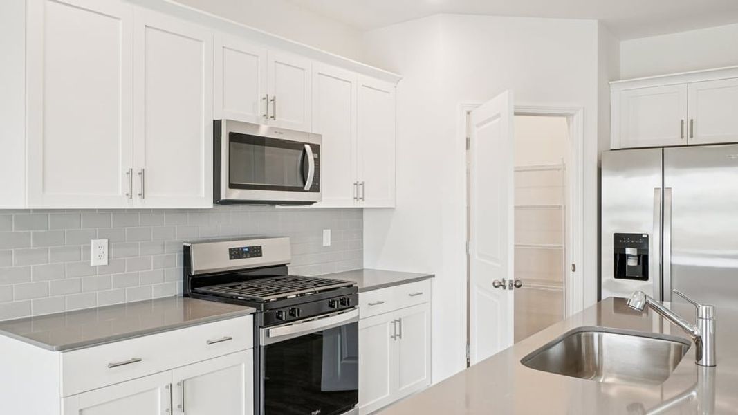 Furnished interior view inside a new home in The Reserve at Prestleigh, Wake Forest (Image 6). Furnished interior view inside a new home in The Reserve at Prestleigh, Wake Forest (Image 6).