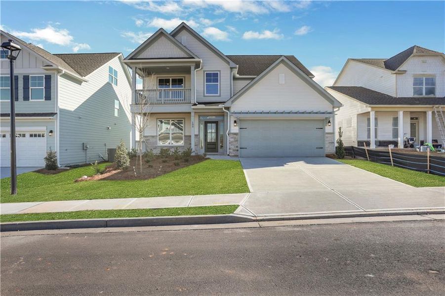 Front exterior of a new home in Twin Lakes, Hoschton, GA, highlighting curb appeal (Image 25).