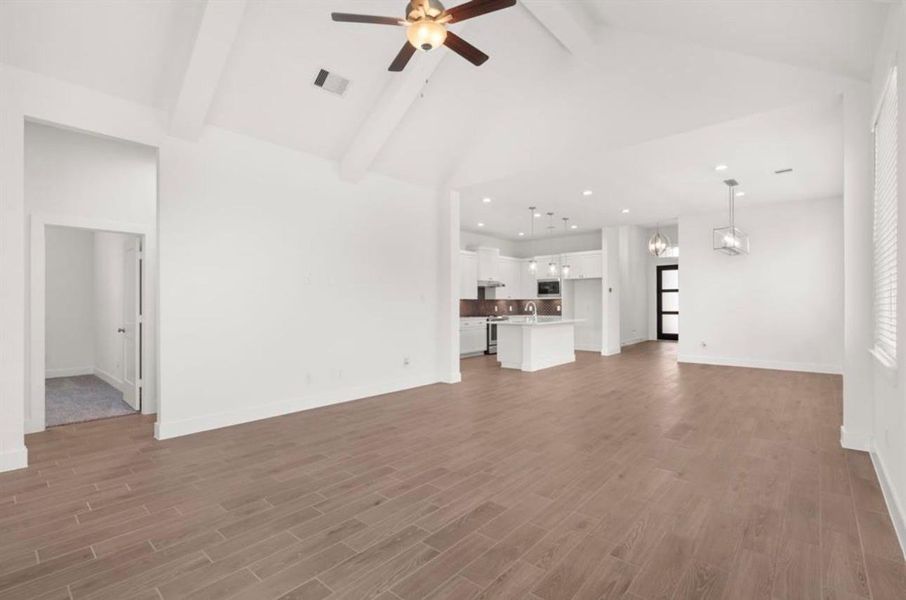 Spacious, unfurnished interior of a new home in Sunterra, Katy (Image 9).