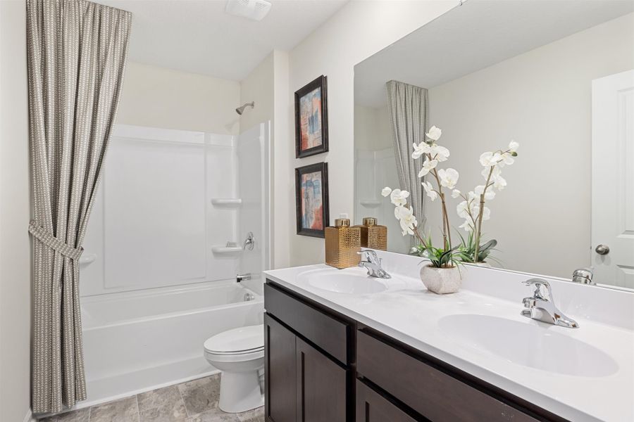 Representative furnished interior of a home built from the Hanover by D.R. Horton in Hillcrest Landing, McDonald (Image 22).