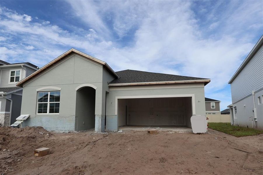 Exterior details and patio area of a home in Bay Lake Farms, St. Cloud (Image 3).