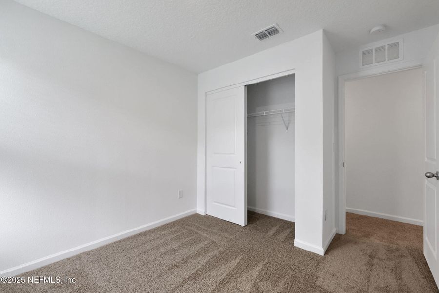 Spacious, unfurnished interior of a new home in Kasen Oaks, Jacksonville (Image 20).
