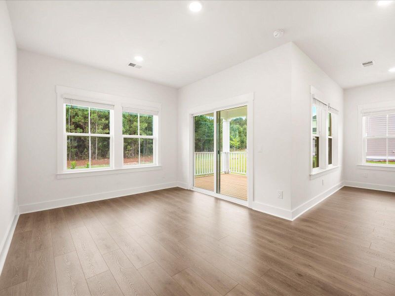 Spacious, unfurnished interior of a new home in The Coves at Lakes of Cane Bay, Summerville (Image 18).