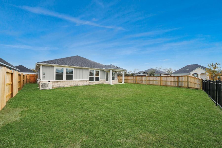 Exterior details and patio area of a home in Laurel Landing: Landmark Collection, Alvin (Image 3).