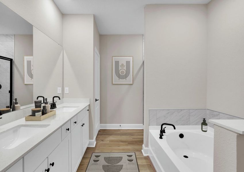 Do your morning skin care routine in this massive master bathroom