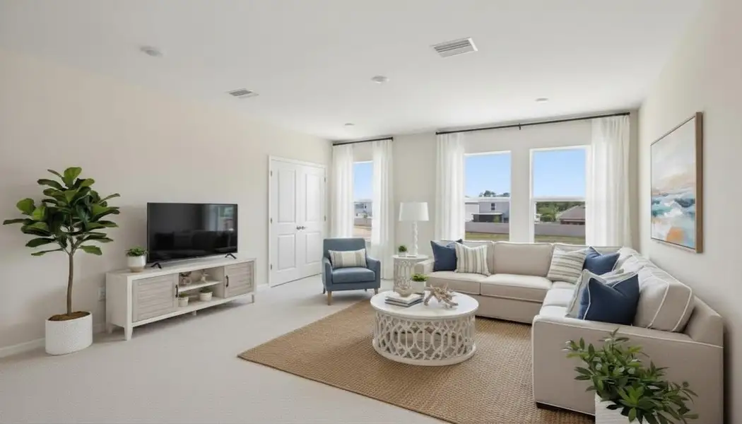 Representative furnished interior of a home built from the Coral by D.R. Horton in Deerbrook, Land O' Lakes (Image 6).