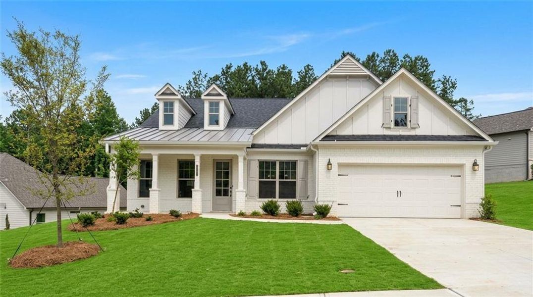 Front exterior of a new home in , Canton, GA, highlighting curb appeal (Image 1). Front exterior of a new home in , Canton, GA, highlighting curb appeal (Image 1).