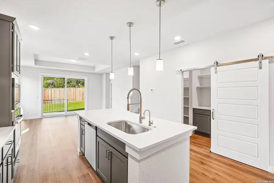 Furnished interior view inside a new home in Weston Oaks, San Antonio (Image 7).