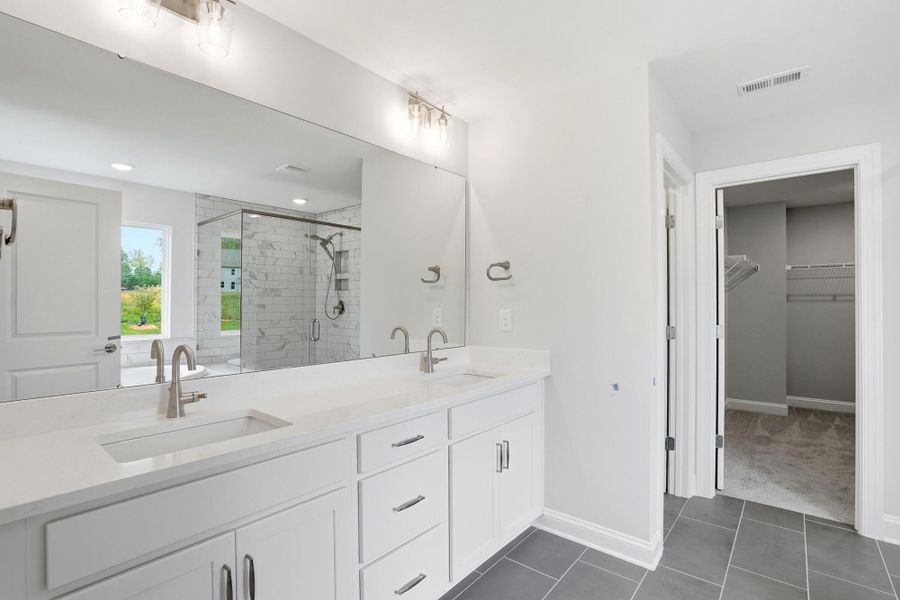 Furnished interior view inside a new home in Enclave at Riverdale, Huntersville (Image 11).