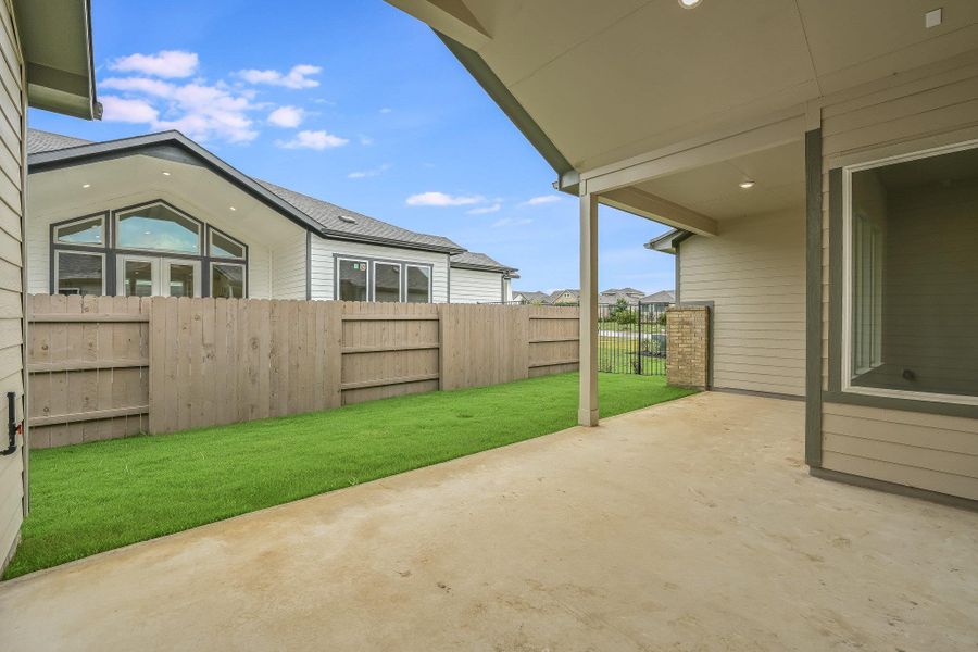 View of yard with a patio