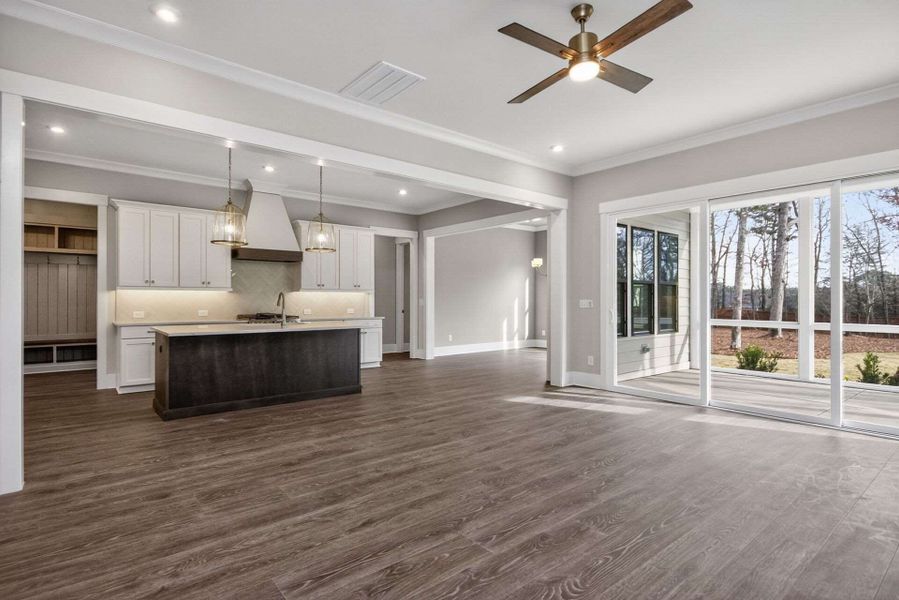 Representative unfurnished interior of a home built from the Brassfield Craftsman by Homes by Dickerson in Corbett Landing, Pittsboro (Image 8).