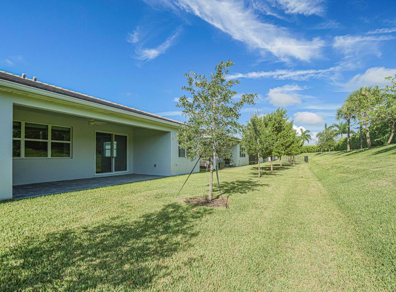 Front exterior of a new home in , Port St. Lucie, FL, highlighting curb appeal (Image 2).