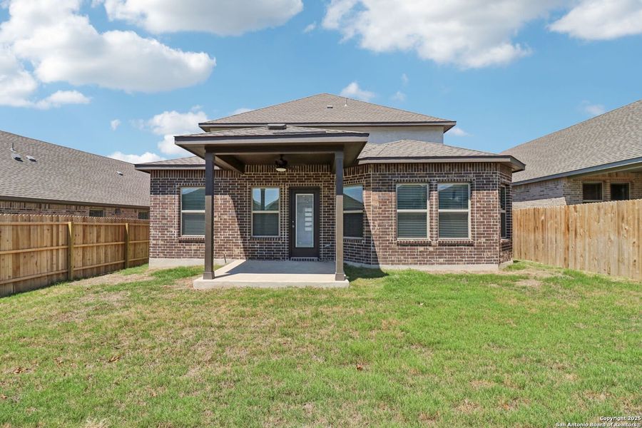 Front exterior of a new home in Arcadia Ridge - Premier Series, San Antonio, TX, highlighting curb appeal (Image 21).
