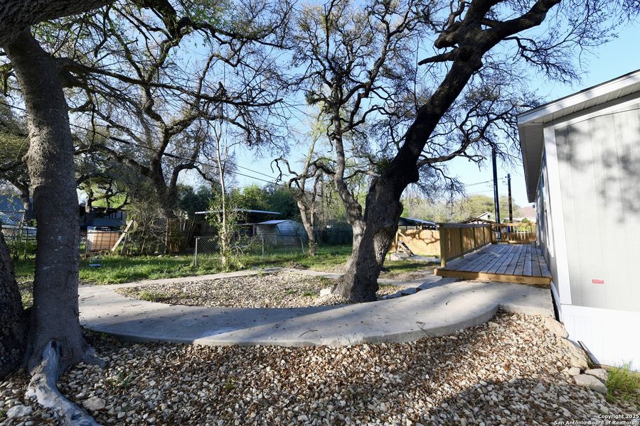 Front exterior of a new home in , San Antonio, TX, highlighting curb appeal (Image 14).