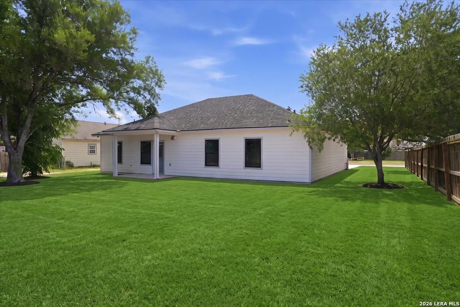 Exterior details and patio area of a home in , Beeville (Image 24).