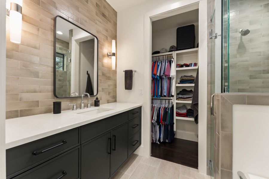 Full bathroom on the second floor with a walk-in shower.