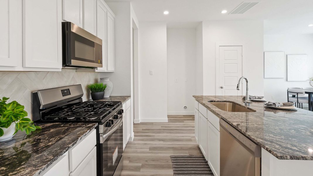 Furnished interior view inside a new home in Grand West, Houston (Image 3).
