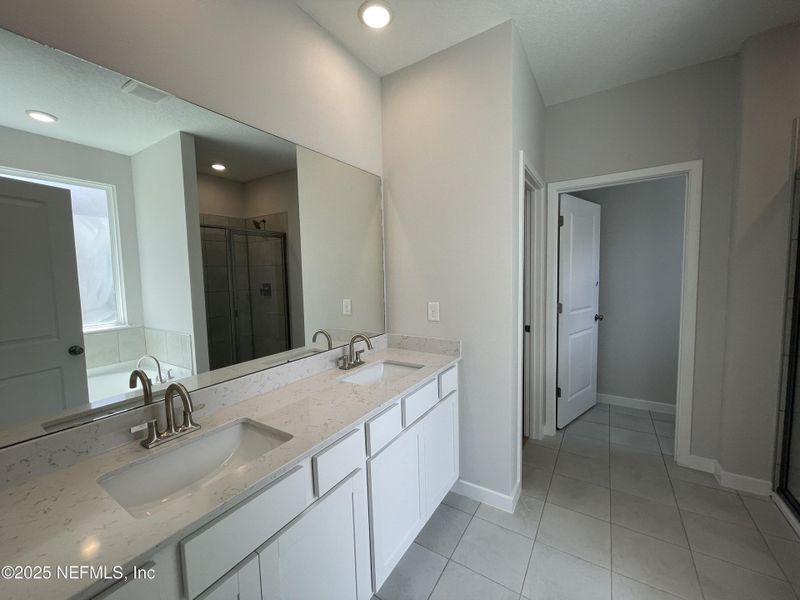 Furnished interior view inside a new home in The Magnolia Series at Reserve East, Flagler Beach (Image 9).