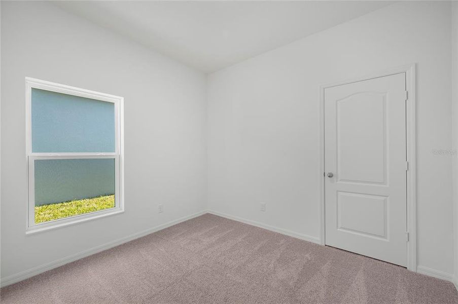 Spacious, unfurnished interior of a new home in Gum Lake Preserve, Lake Alfred (Image 22).