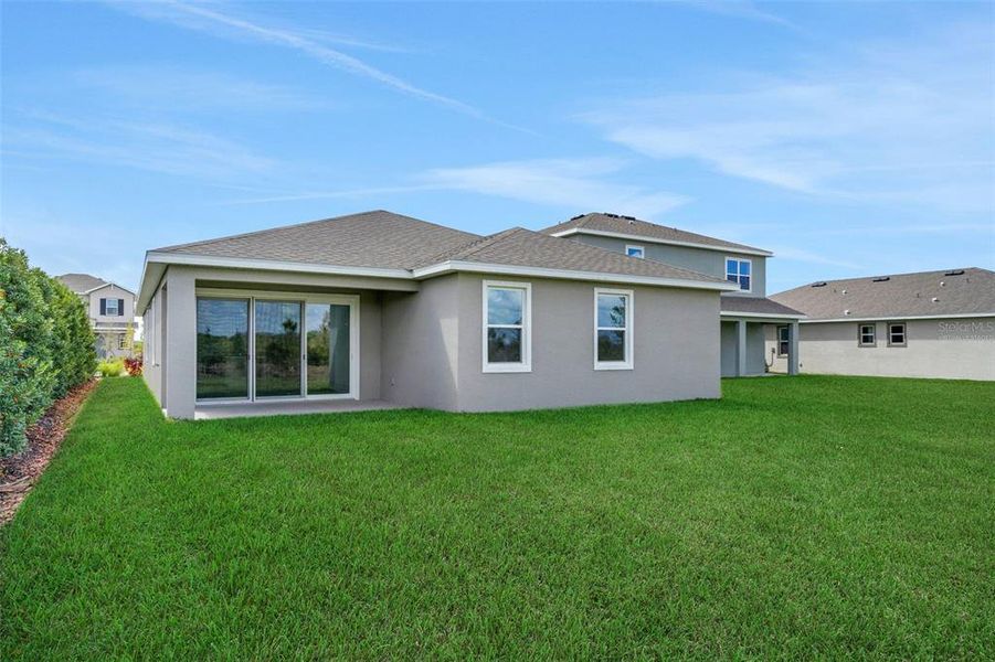 Exterior details and patio area of a home in Turnleaf, Punta Gorda (Image 3).