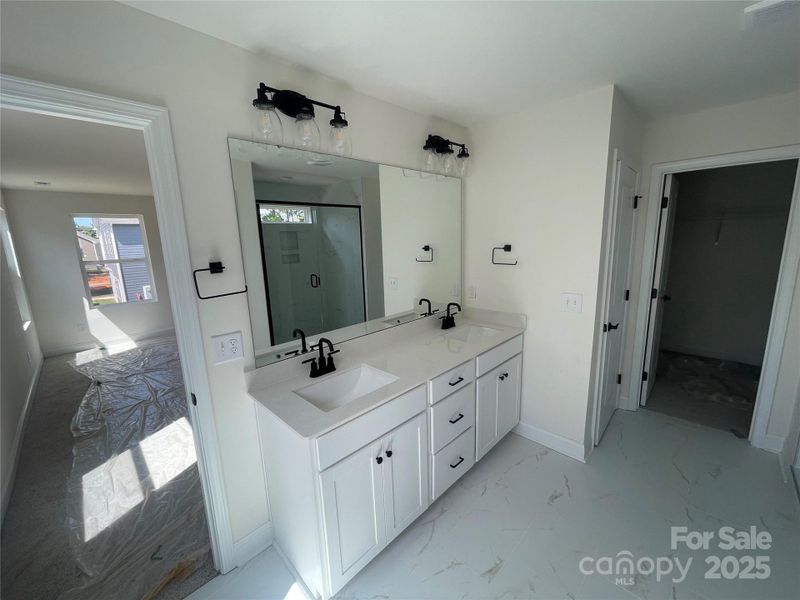 Primary Bath with linen closet, large walk in closet and shower Primary Bath with linen closet, large walk in closet and shower