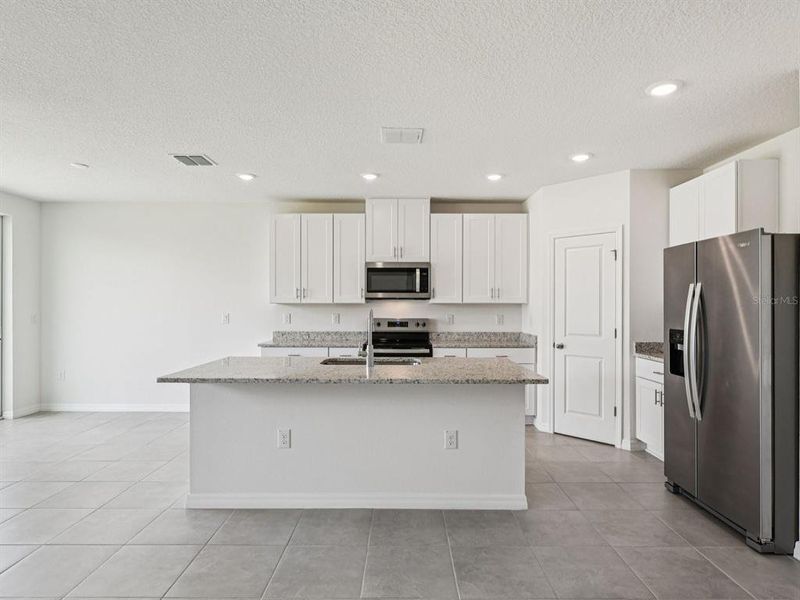 Furnished interior view inside a new home in Benton Hills - Classic Series, Brooksville (Image 11).