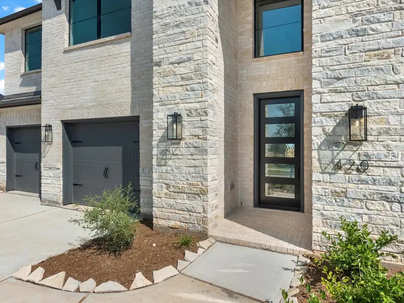 Exterior details and patio area of a home in Grange - 55', Katy (Image 2). Exterior details and patio area of a home in Grange - 55', Katy (Image 2).