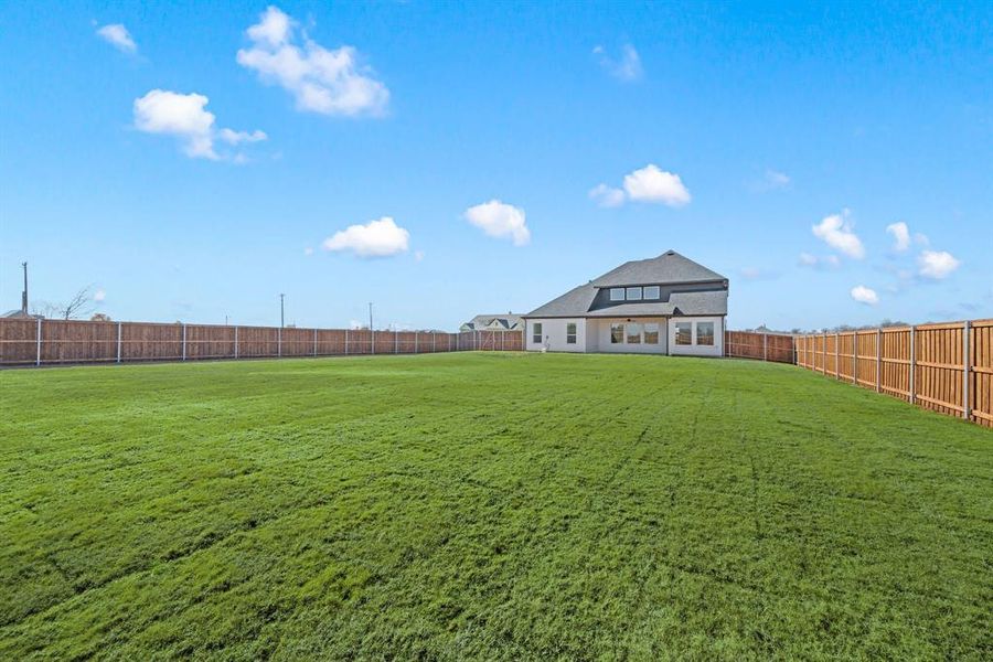 Exterior details and patio area of a home in Settlers Glen, New Fairview (Image 24).