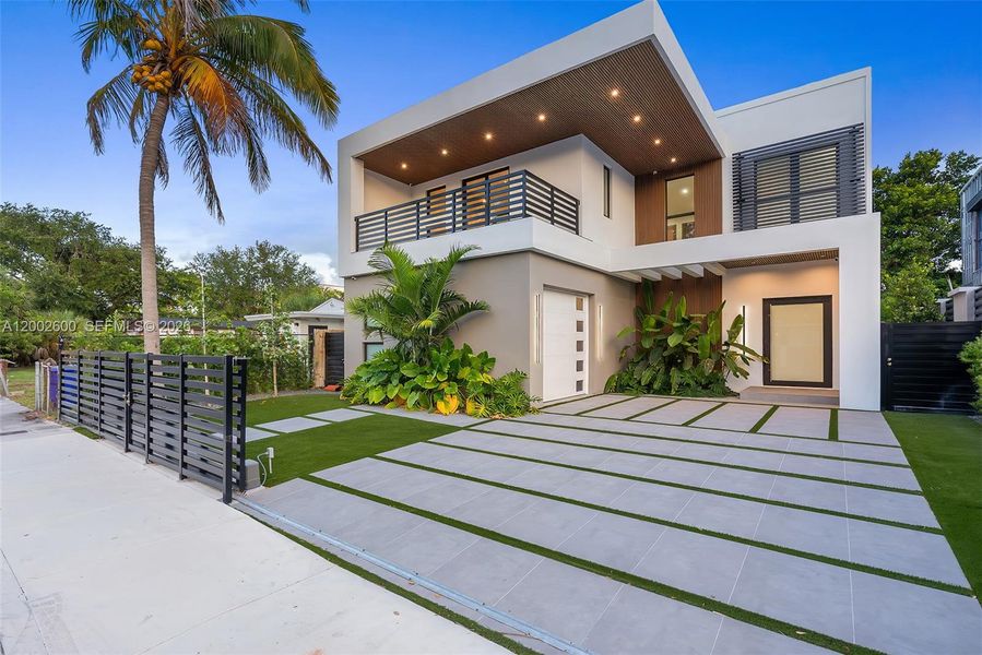Front exterior of a new home in , Miami, FL, highlighting curb appeal (Image 26).
