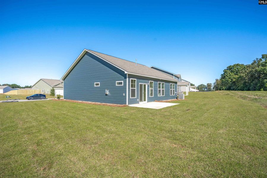 Exterior details and patio area of a home in Rolling Hills, Prosperity (Image 4).