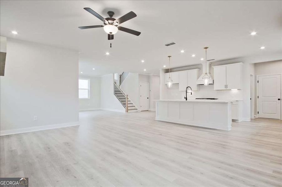 Spacious, unfurnished interior of a new home in The Paddocks at Doc Hughes, Buford (Image 20).