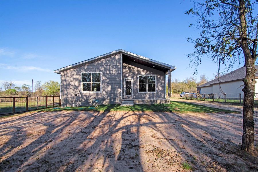 Exterior details and patio area of a home in , Bastrop (Image 3).
