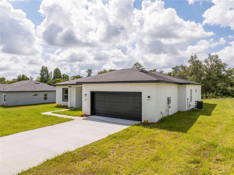 Front exterior of a new home in , Ocala, FL, highlighting curb appeal (Image 33).
