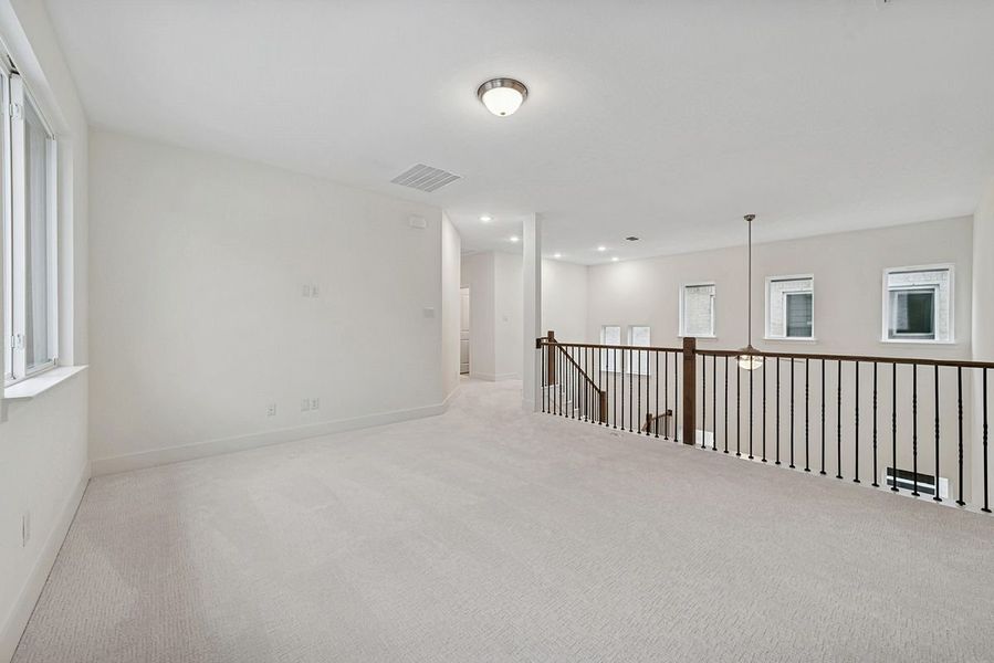 Representative furnished interior of a home built from the Riseley by Landon Homes in Fields - East Village, Frisco (Image 26).