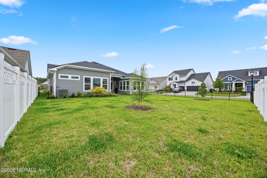 Exterior details and patio area of a home in Oak Grove at SilverLeaf 60’, St. Augustine (Image 23).
