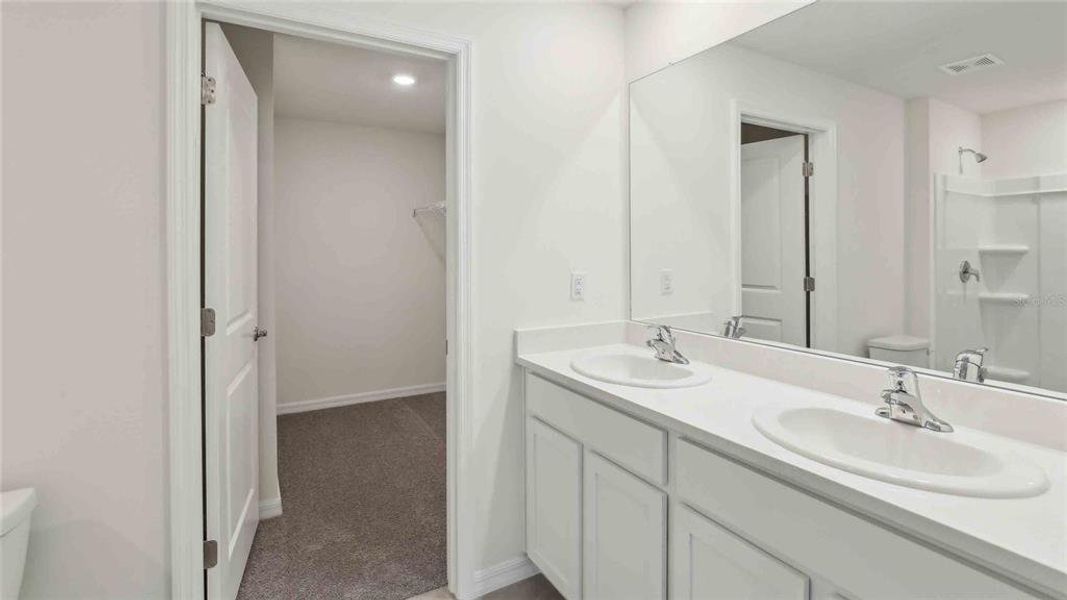 Furnished interior view inside a new home in Triumph South, Wildwood (Image 11). Furnished interior view inside a new home in Triumph South, Wildwood (Image 11).