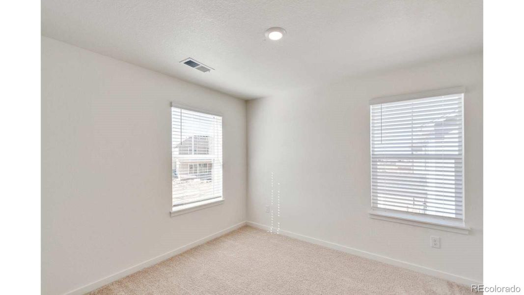 Spacious, unfurnished interior of a new home in The Ridge at Lorson Ranch, Colorado Springs (Image 19).