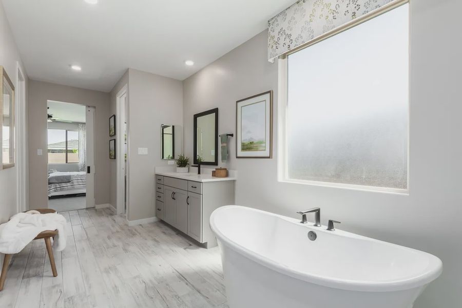 Representative furnished interior of a home built from the 2326 by Elliott Homes in Acacia at Santana, Yuma (Image 34).