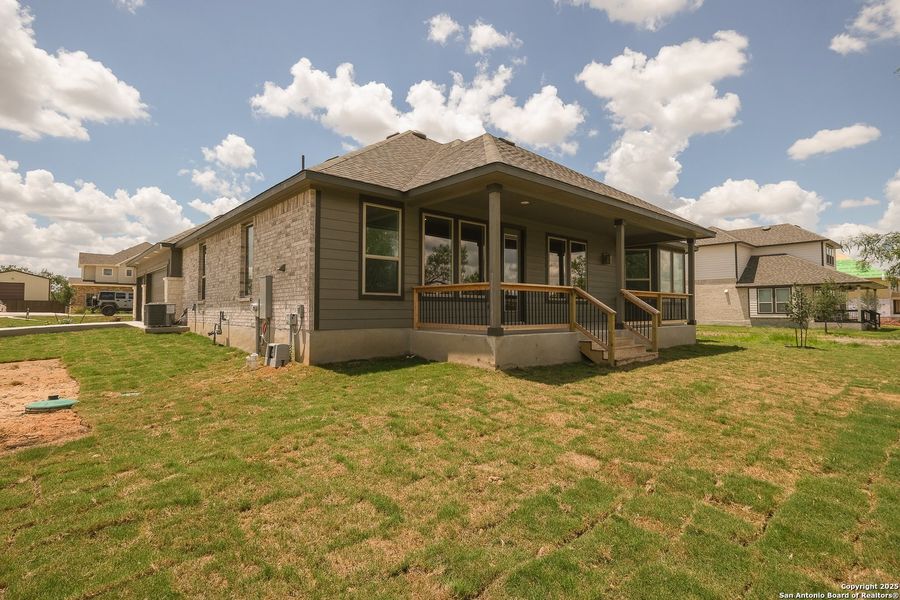 Front exterior of a new home in Everly Estates, San Antonio, TX, highlighting curb appeal (Image 17).
