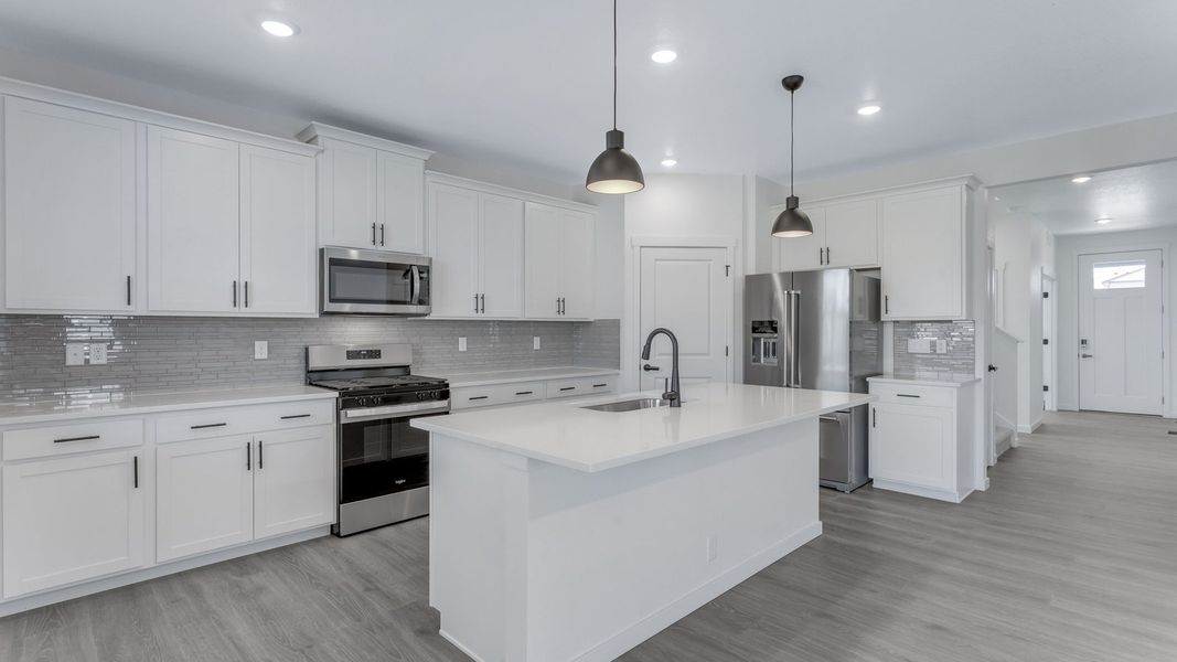 Representative furnished interior of a home built from the Calhan by D.R. Horton in Vantage, Berthoud (Image 5).