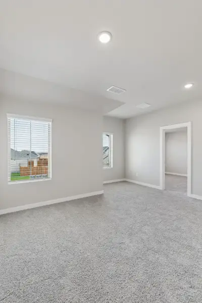Game Room in the Holden home plan by Trophy Signature Homes – REPRESENTATIVE PHOTO