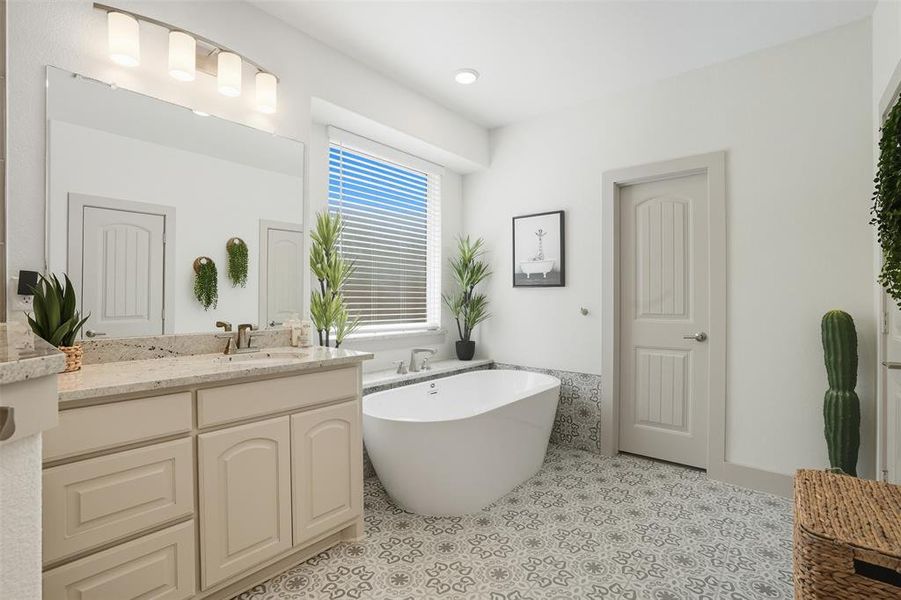 Bathroom with a freestanding bath and vanity Bathroom with a freestanding bath and vanity