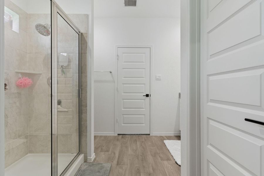 Luxurious ensuite with dual granite vanities, massive walk-in shower, and a large closet. Luxurious ensuite with dual granite vanities, massive walk-in shower, and a large closet.